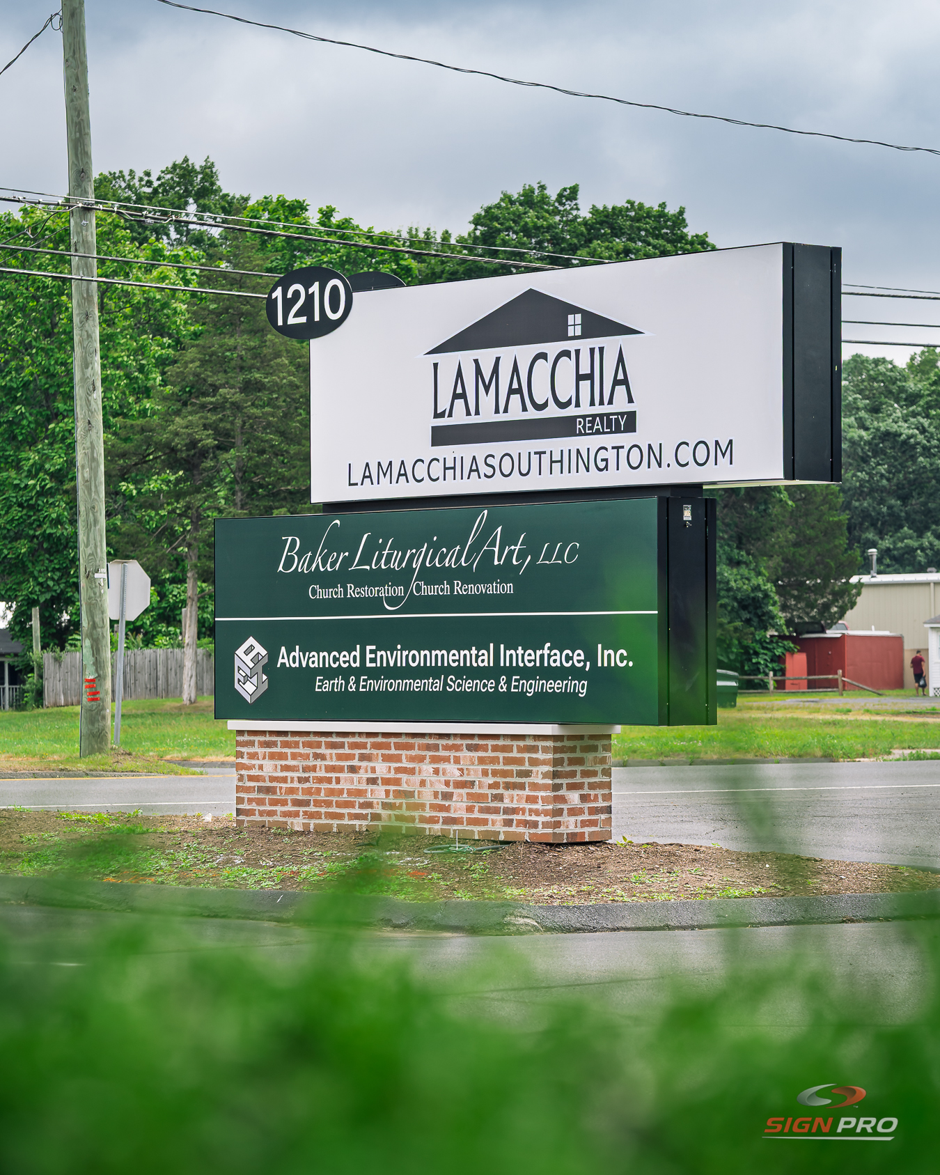 Custom multi-tenant monument sign fabricated and installed by Sign Pro, providing professional visibility for multiple businesses at a commercial property.