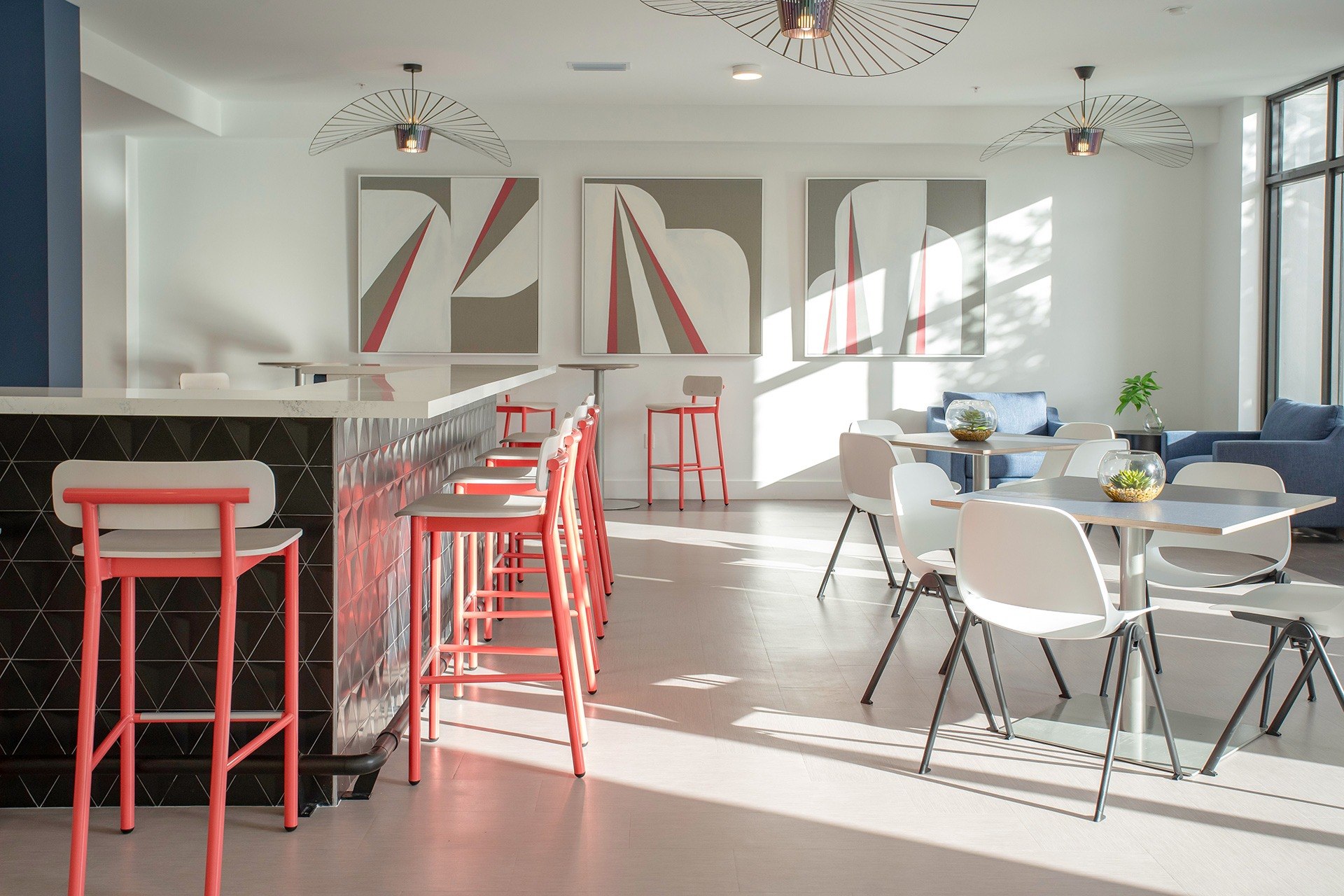 Community clubhouse with bar seating and dining area