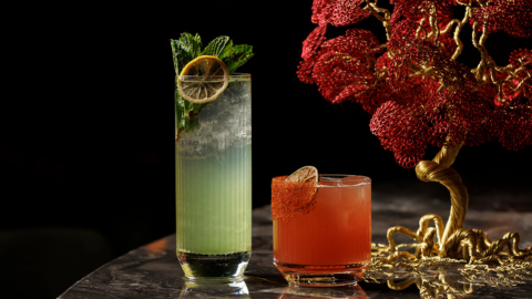 Discover signature cocktails at Mr. H in Boston’s Seaport District. Enjoy the Coral Haze with mezcal 