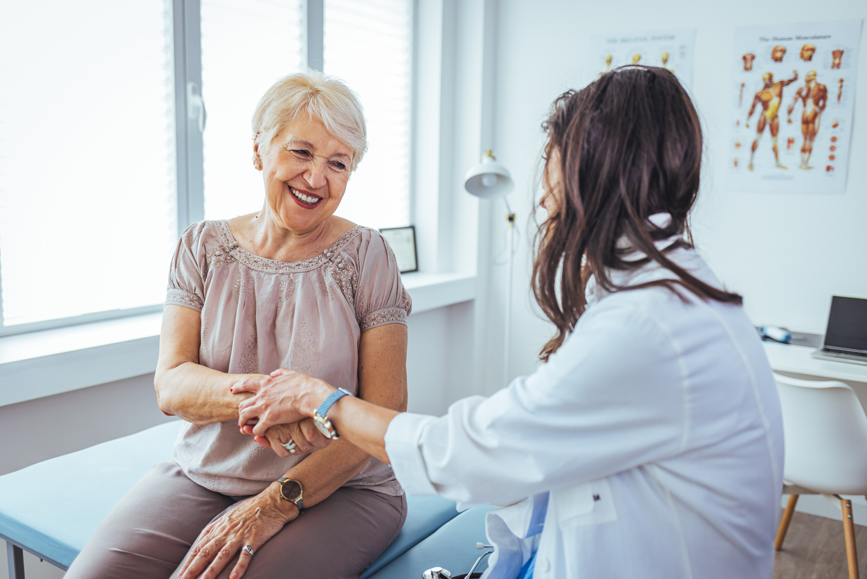 Doctor talking with patient