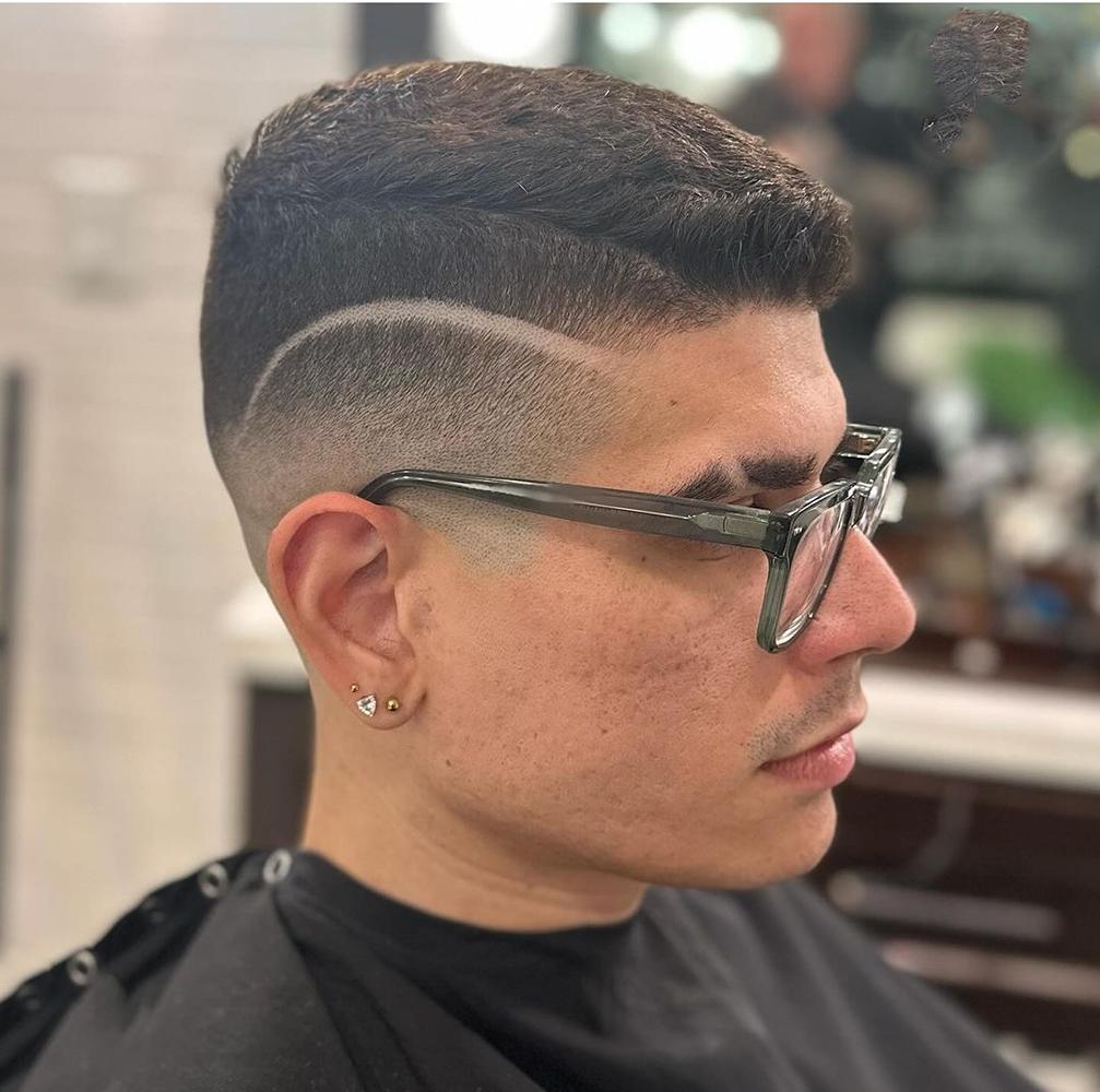 Mid Skin Fade Haircut with Design