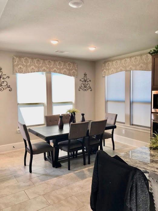 Roller Shades by Budget Blinds of Katy & Sugar Land allow you to block out harsh rays and bright lights while still maintaining a view outdoors! #BudgetBlindsKatySugarLand #ShadesofBeauty #FreeConsultation #RollerShades