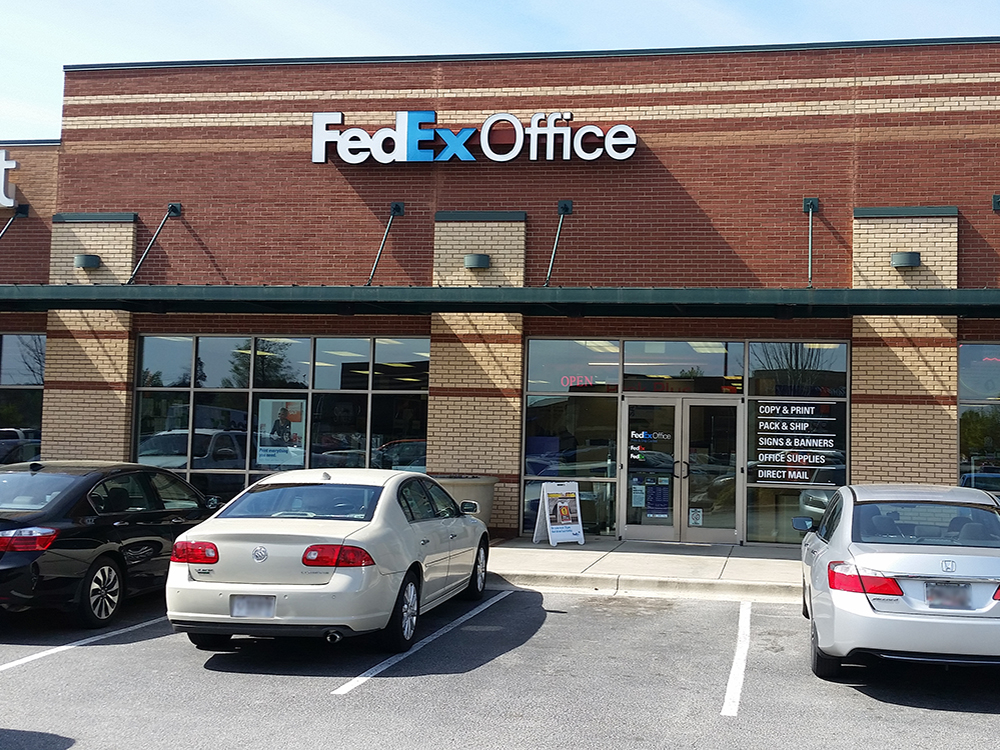 Exterior photo of FedEx Office location at 4239 Washington Rd\t Print quickly and easily in the self-service area at the FedEx Office location 4239 Washington Rd from email, USB, or the cloud\t FedEx Office Print & Go near 4239 Washington Rd\t Shipping boxes and packing services available at FedEx Office 4239 Washington Rd\t Get banners, signs, posters and prints at FedEx Office 4239 Washington Rd\t Full service printing and packing at FedEx Office 4239 Washington Rd\t Drop off FedEx packages near 4239 Washington Rd\t FedEx shipping near 4239 Washington Rd