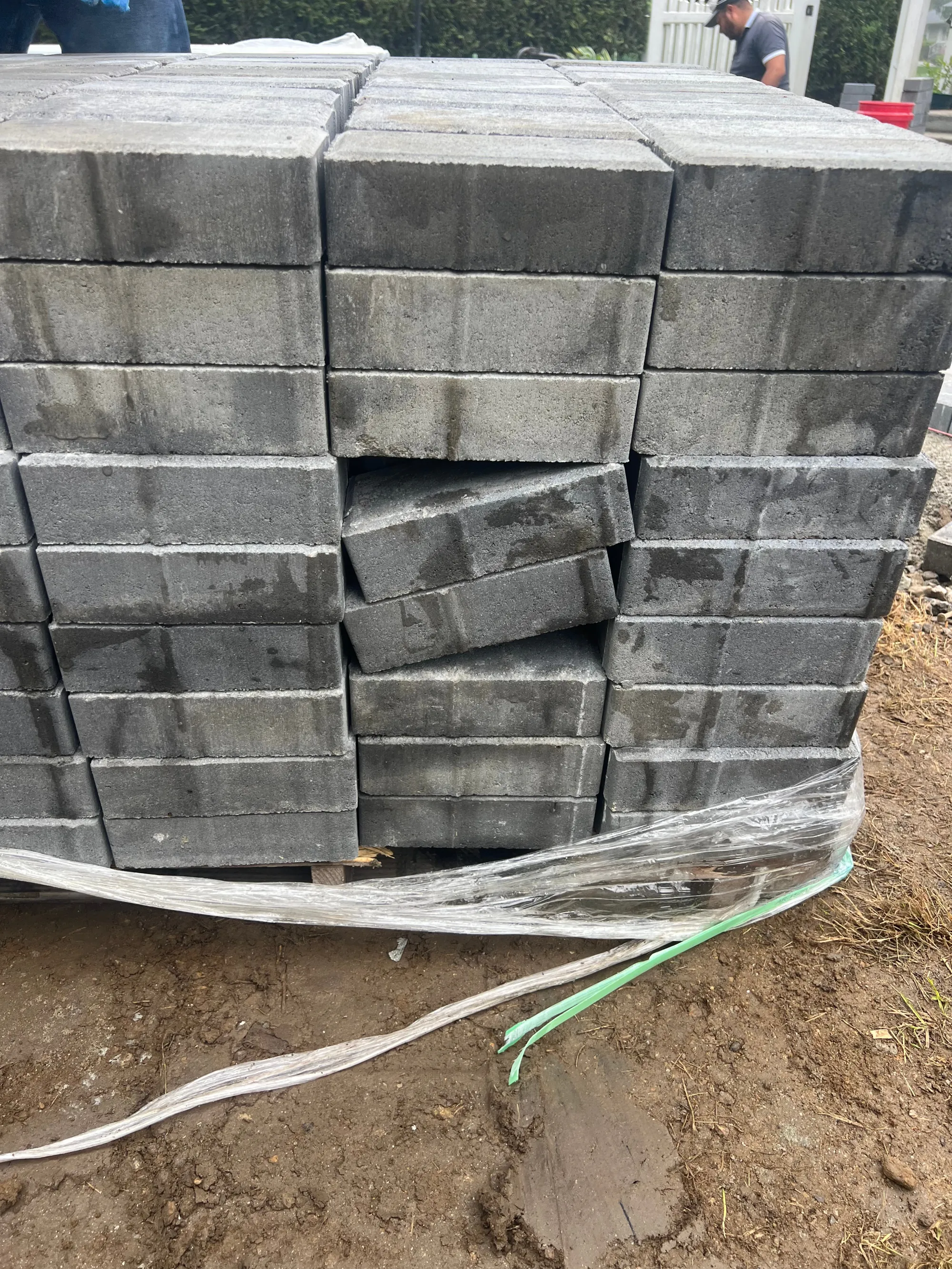 Paver installation in progress on a Trumbull patio - Multi-Layered Paver Patio, Trumbull project by General Masonry LLC.