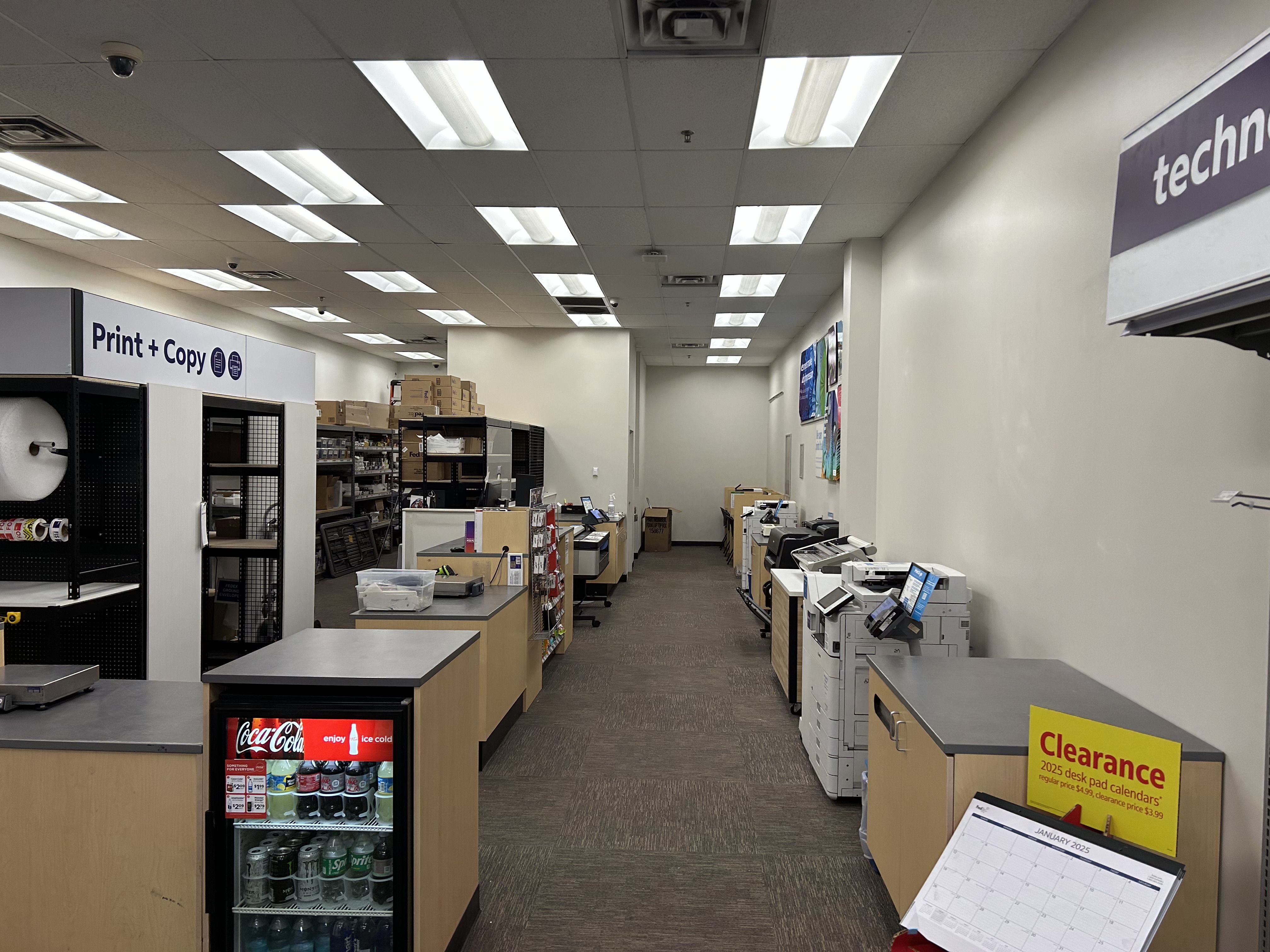 Self-Service Print and Production Area &ndash; Self-service printers and production equipment at FedEx Office in Burleson Texas for copying, printing, and document services.