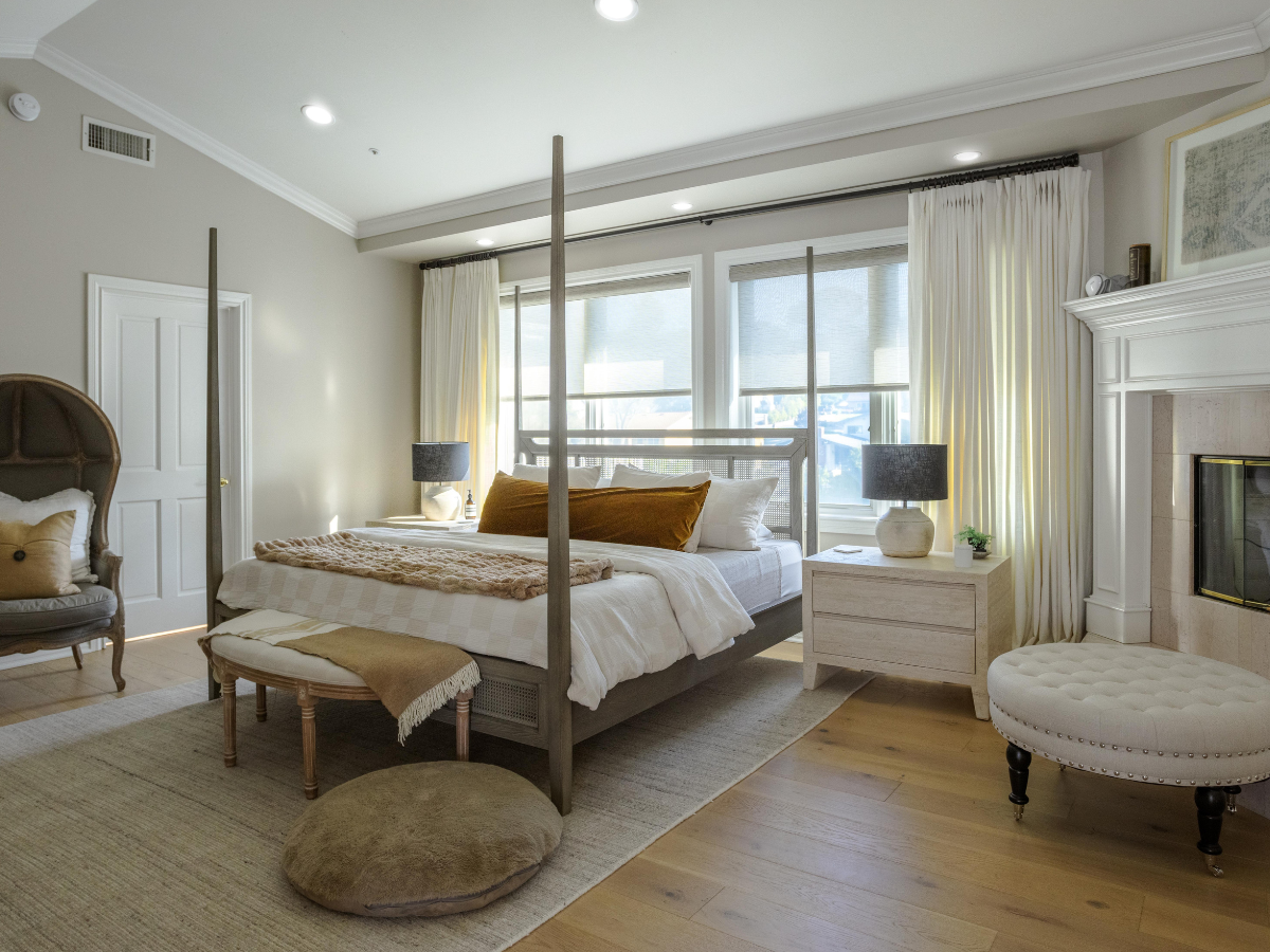 Transform your bedroom with motorized roller shades and drapery, offering ultimate convenience, privacy, security and energy efficiency. Rest easy in a comfortable and stylish space.