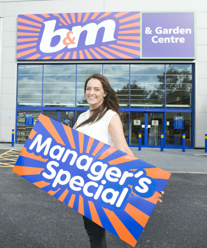 Store manager Kelly Mather poses in front of B&M's brand new Bargains Store & Garden Centre in Brighouse.