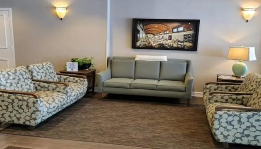 The spacious community room where residents may visit and enjoy daily activities.