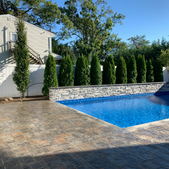 Transform your outdoor space with Bellmore's leading hardscaping experts at BC Lawn Service & Masonry. From elegant patio installations to sturdy retaining walls, we bring your vision to life with precision and passion.