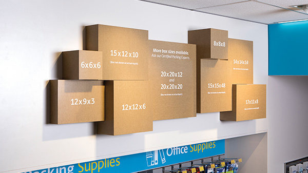 Employee packing item in a box using inflatable air cushions