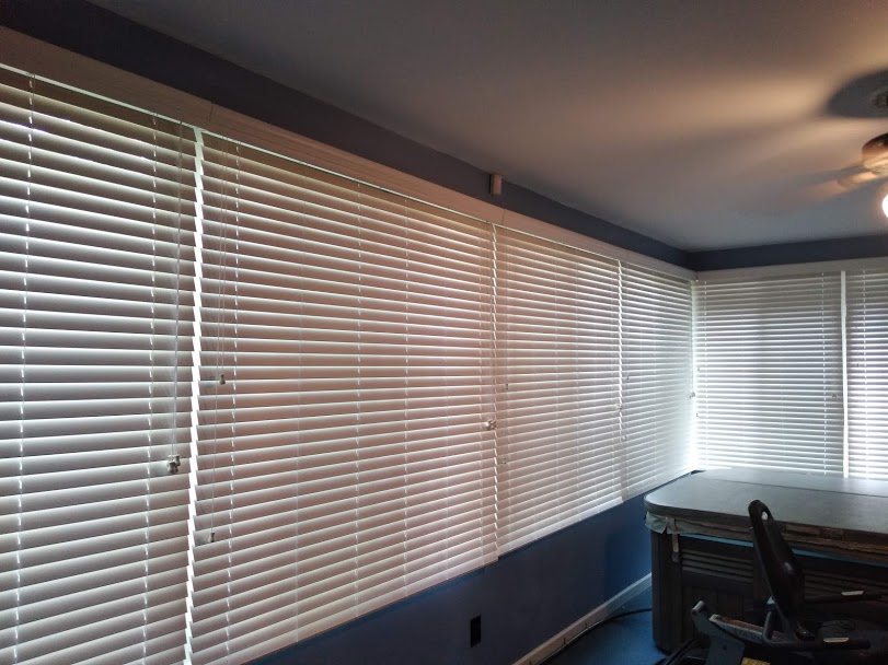 Blinds for Sunporch:  Got awkward shapes and hard to cover windows? At Budget Blinds we have got you covered!  This customer of ours had two full walls of windows to cover with little to no mounting space. Thanks to our professional installer we were able to provide them with privacy and they love t