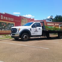 Images Plunkett Tow Service, LLC