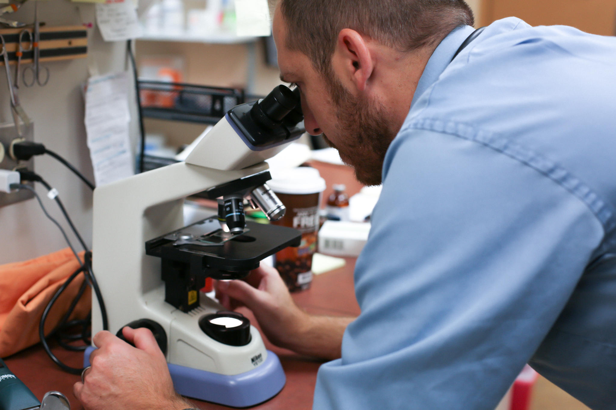 Dr. Thomas Vinson examines a sample using a microscope in our convenient, fully equipped in-house lab. We are able to perform urinalysis, parasite testing, fungal cultures, blood work, and much more.