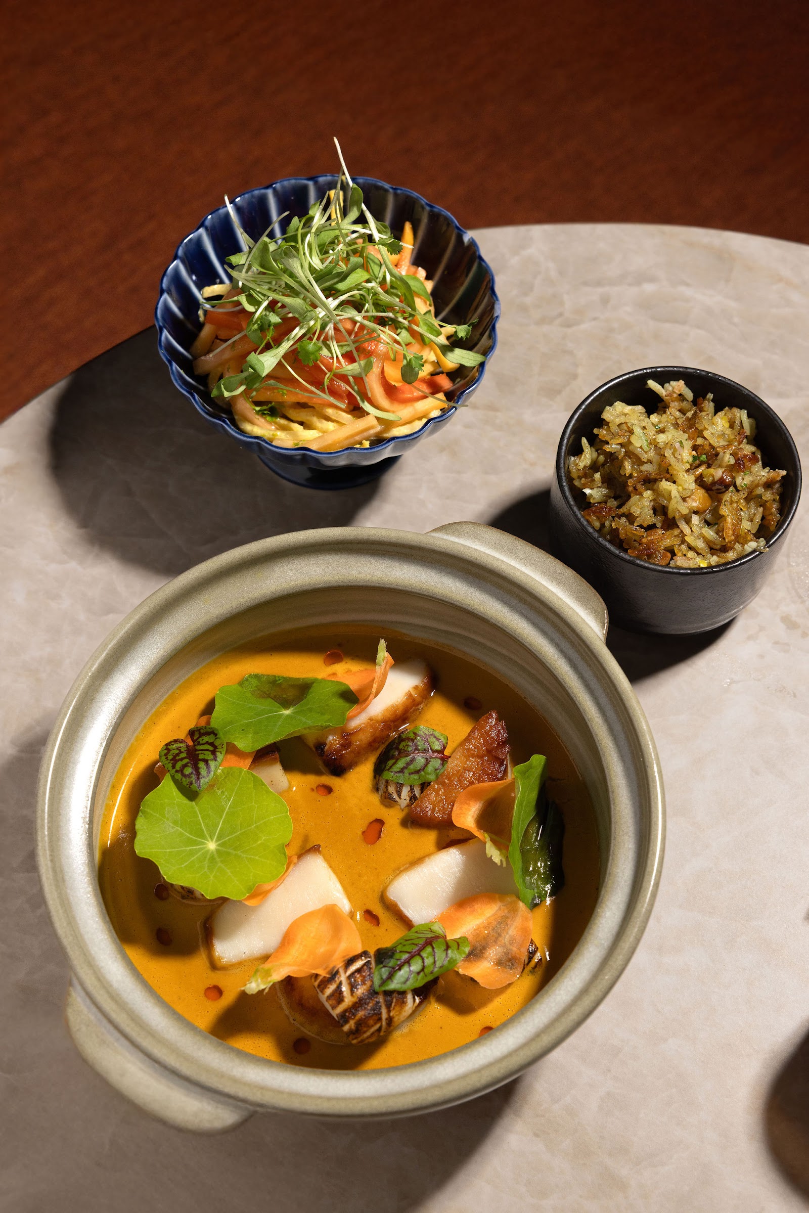 A Caribbean-inspired soup and rice course from the Markette kitchen. Served in the dining room in Chelsea, Manhattan.