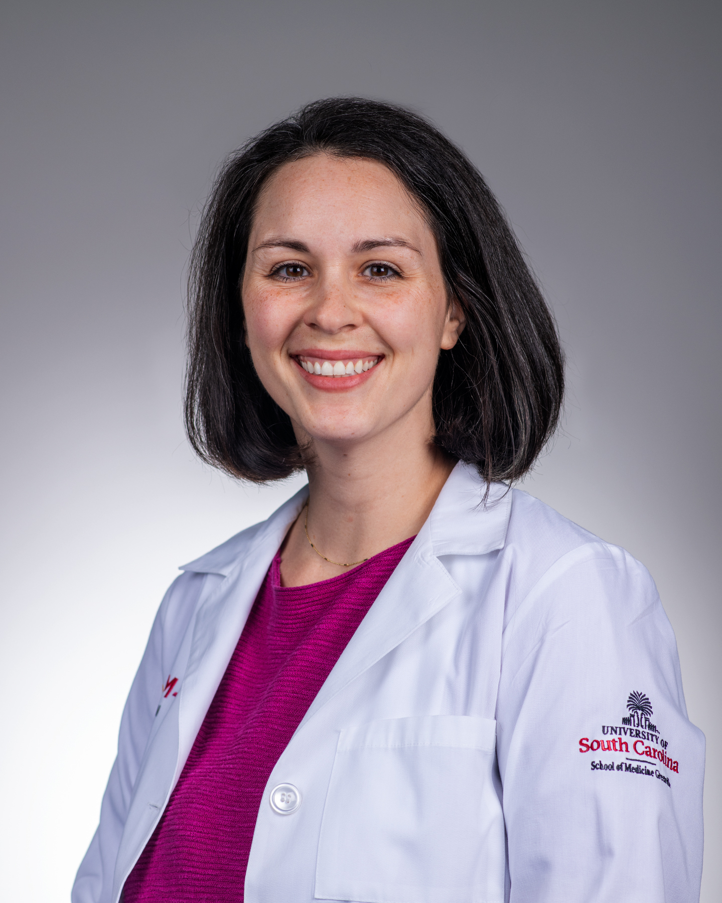 Olivia Wells, MD