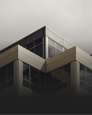 Exterior view of an angular office building.