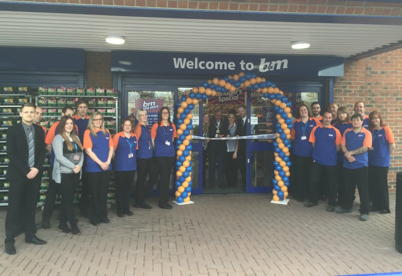 Chairman of East Riding of Yorkshire Council, Councillor Peter Turner cuts the ribbon and officially declares the new B&M Home Store in Willerby, open.