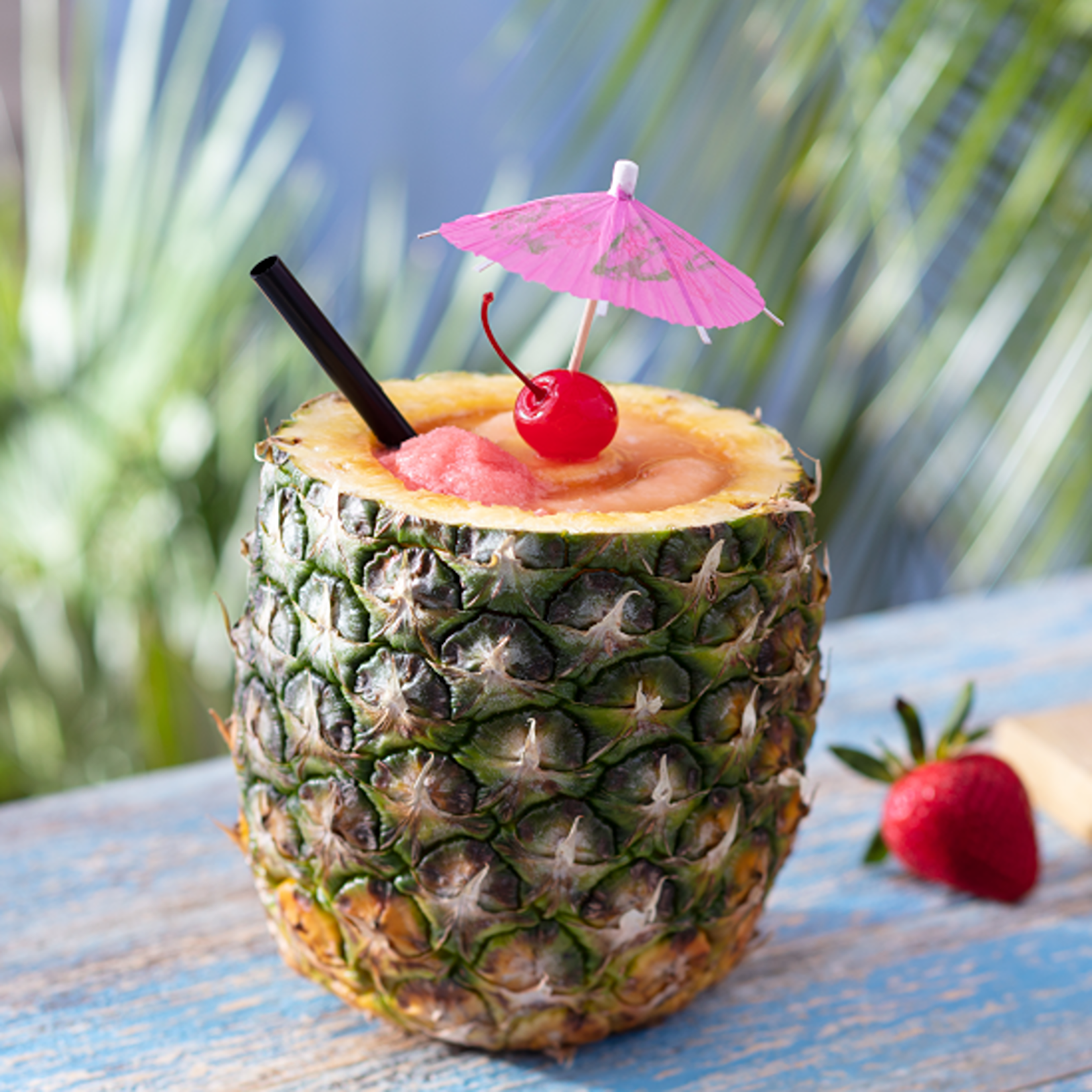 Ultimate Pineapple – With spiced rum, Coco López & Bacardi Black Rum swirled with strawberry ice and served in a freshly cut pineapple.