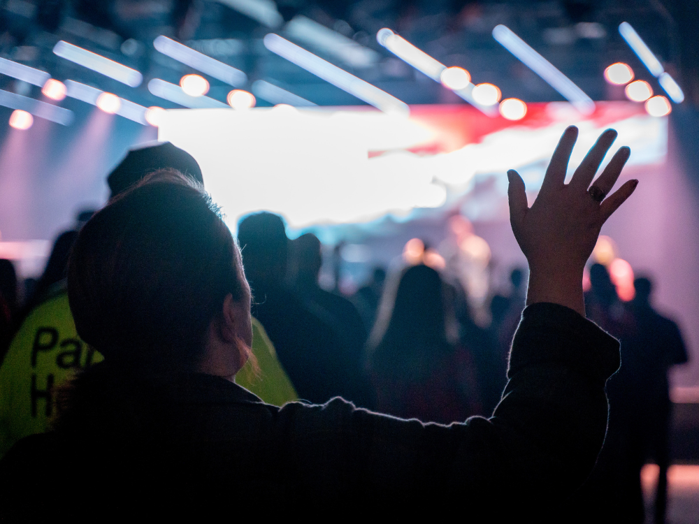 Person worshiping at Church on the Move in Broken Arrow, Oklahoma