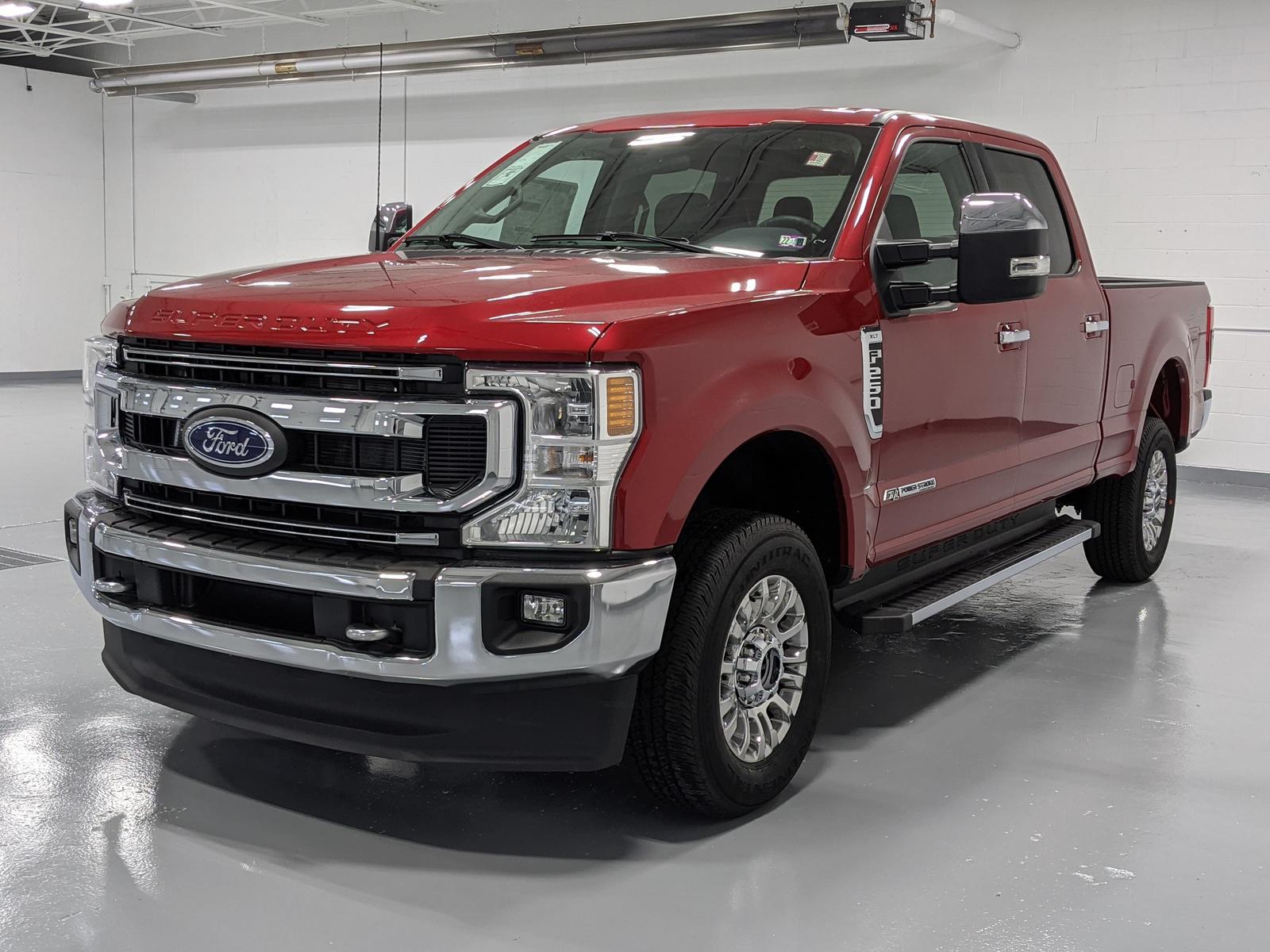 2022 Ford Super Duty F250 XLT 4WD Crew Cab in Rapid Red.