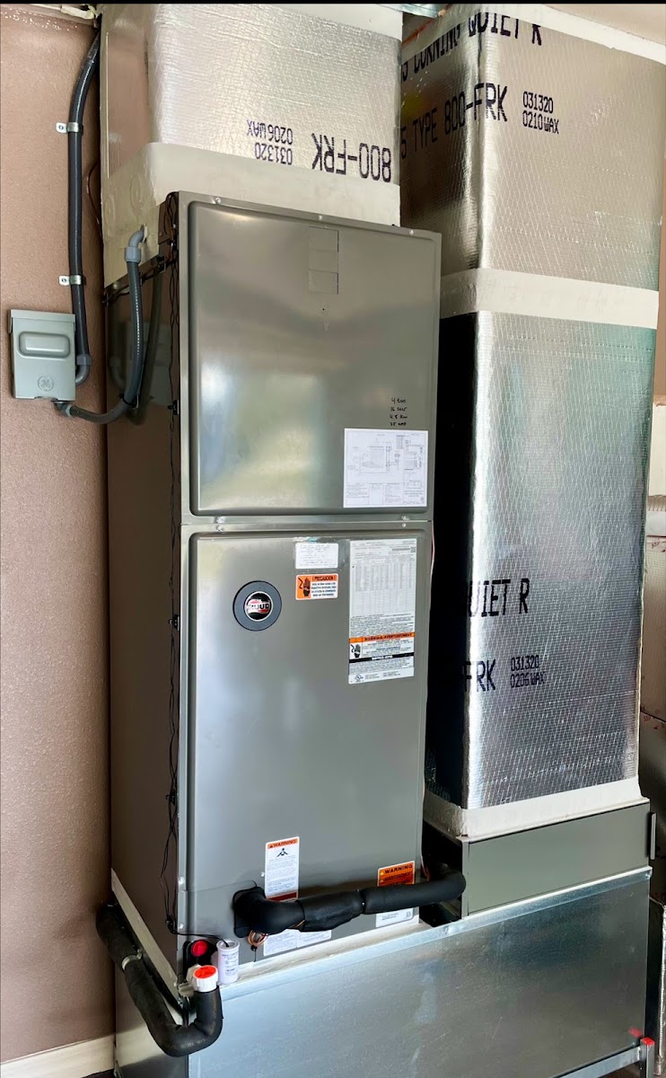 Indoor HVAC air handler installed with clean refrigerant and electrical connections for dependable whole-home comfort.