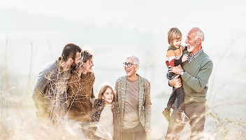 A multigenerational family enjoying a walk together.