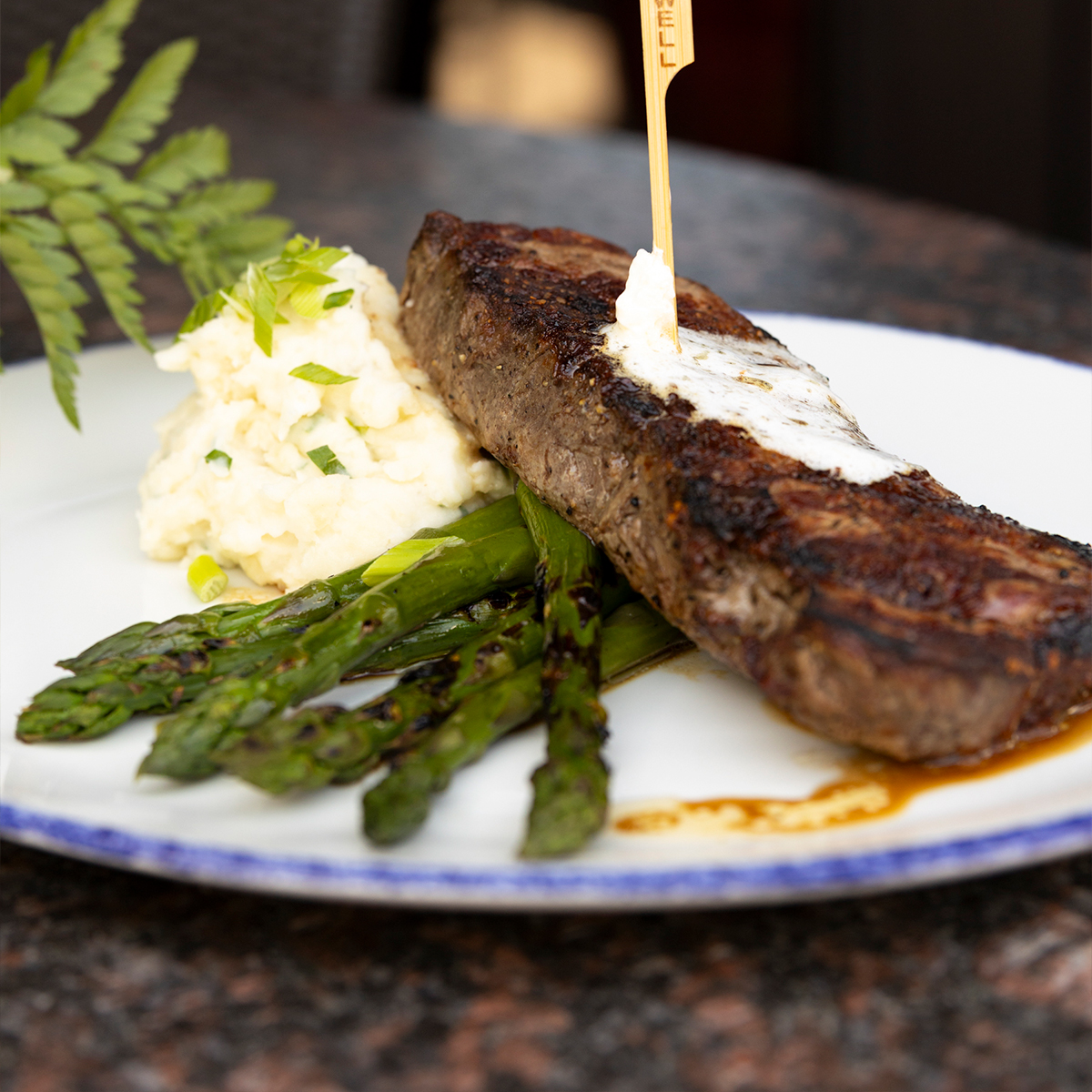 NY Strip | 14oz hand cut, potato choice & grilled asparagus