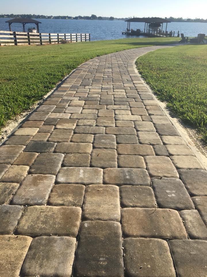 What a beautiful view of the lake that has easy access with a new paver walkway installed