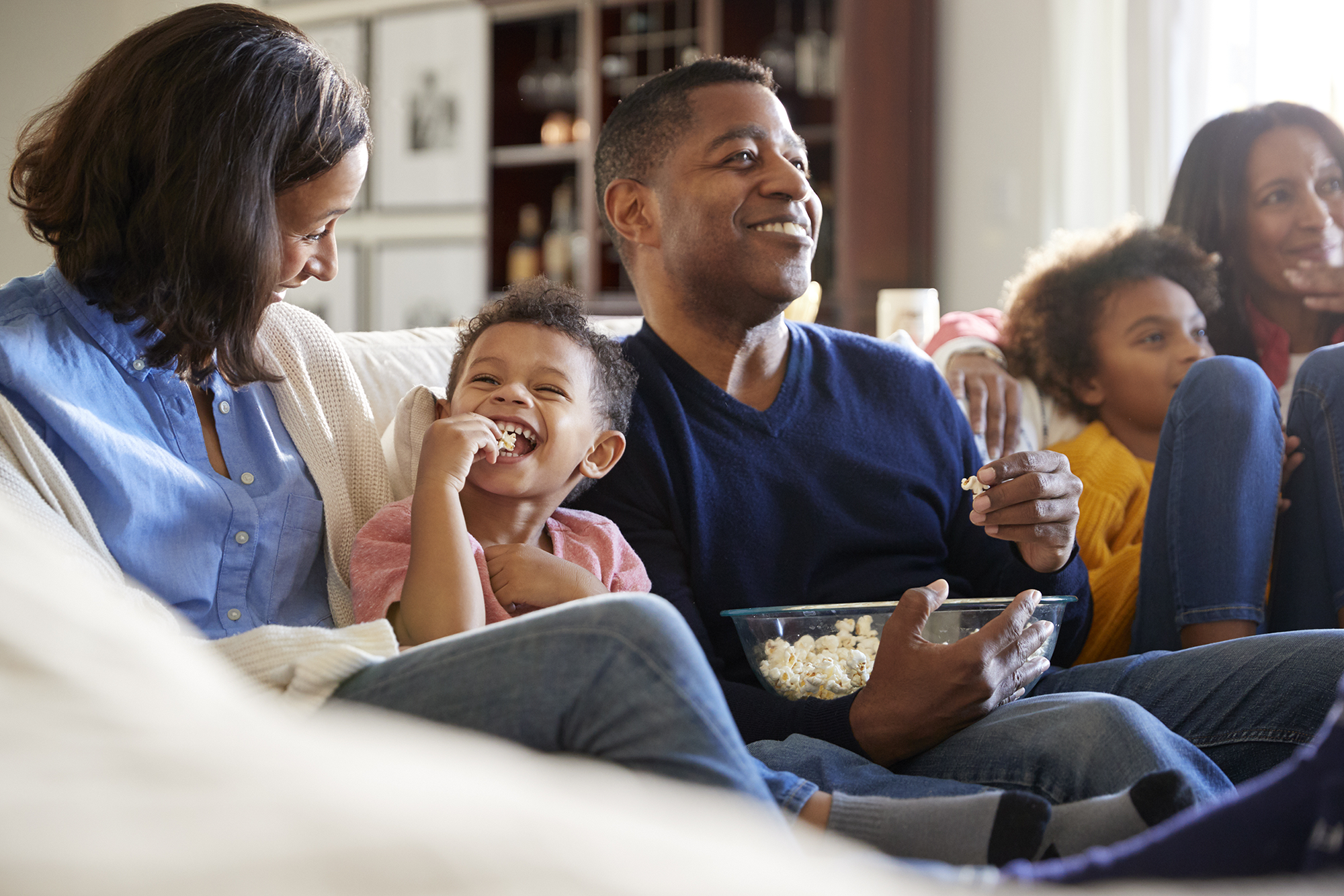 Family watching TV in Greene, RI