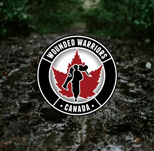 Wounded Warriors Canada emblem — a circular badge with a maple leaf silhouette and soldier motif.