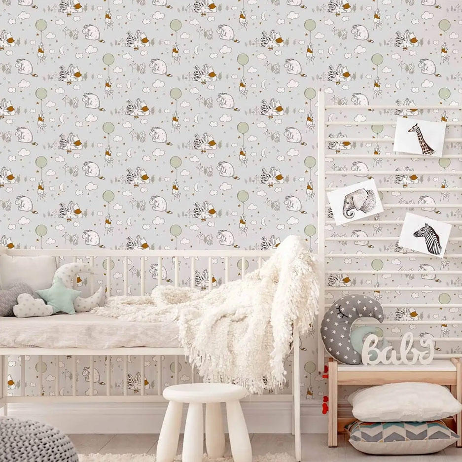 A nursery with disney wallpaper