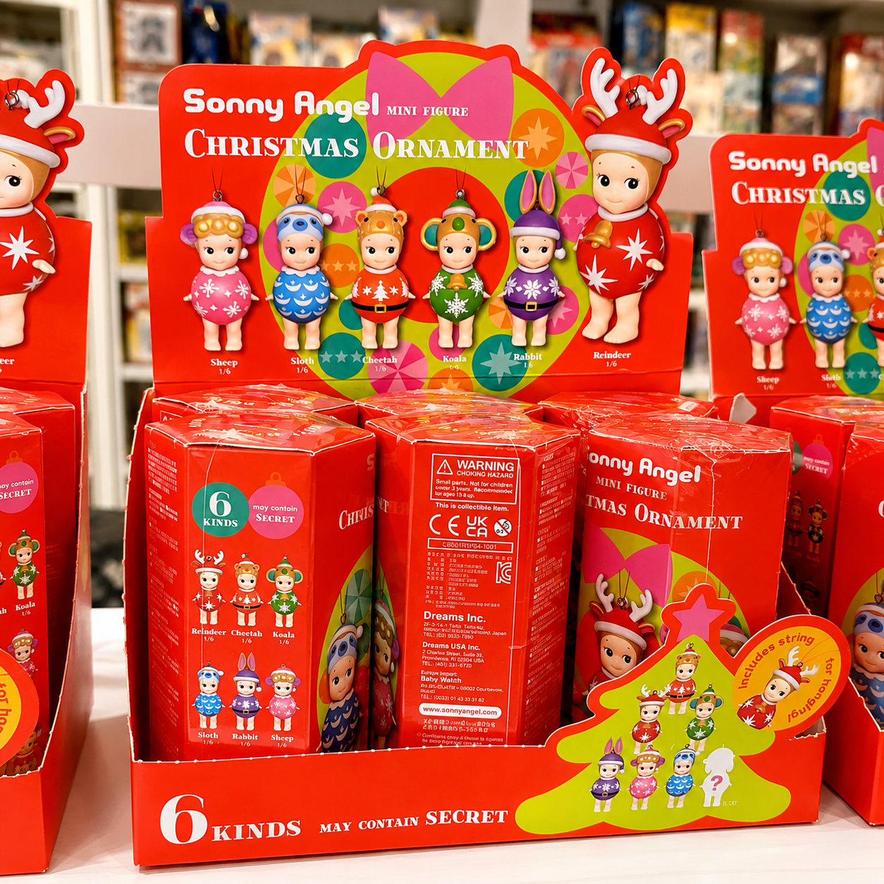 Seasonal-themed collectible figures on display inside The Game Chest. 