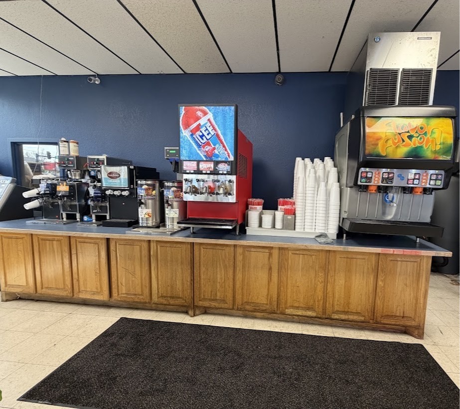 Fountain drink counter and self-serve station at Campus Corner Minit Mart, a drive-thru convenience  