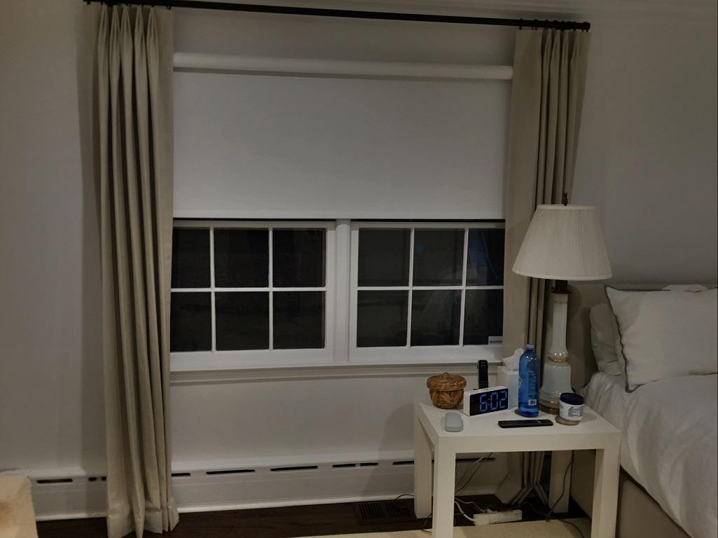Roller Shades by Budget Blinds of Ossining are a classic, versatile window treatment that enhances your home in style. These beautiful window coverings are a classic choice for any style home and are perfect for layering with other stylish window coverings such as Custom Inspired Drapery as seen in