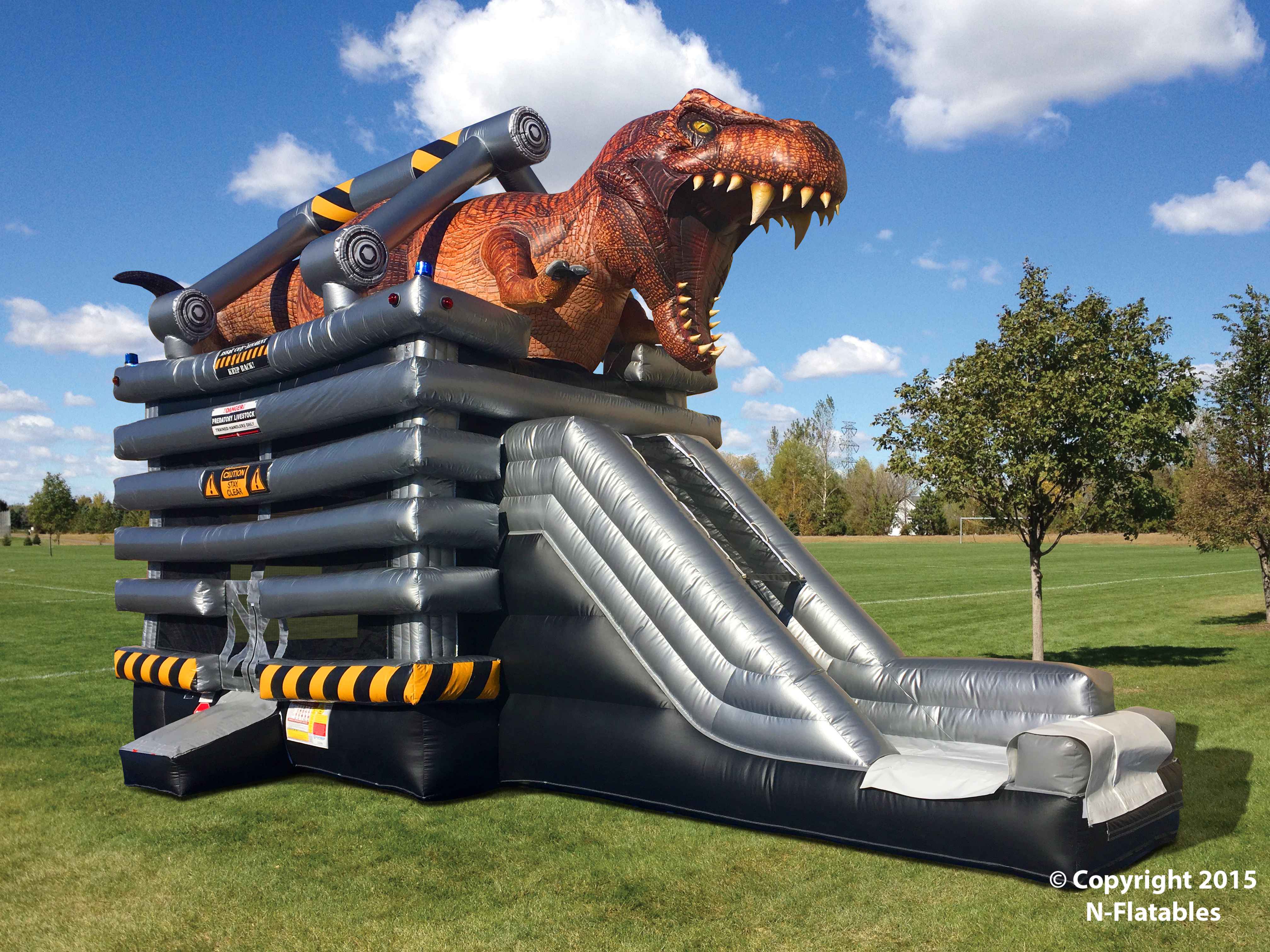 Our T-Rex Dinosaur JUMP AND Slide Combo is the only dinosaur inflatable attraction in all of Long Island .   The T-Rex features life-like graphics that makes its enormous body a work of art!   The details of the skin and the sharpness of its teeth is guaranteed to stand out more than anything you've ever seen.

We want to hear you ROOOOOAR! Don’t be afraid of T-Rex, he just wants you to have fun.  Kids and adults will be blown away when they see it.  The bounce house is located on the inside of the T-Rex's cage.  And the fun slide is accessible from inside the bounce house.  Renting the T-Rex Combo is a no-brainer for dinosaur enthusiasts, special event planners, and activity directors.