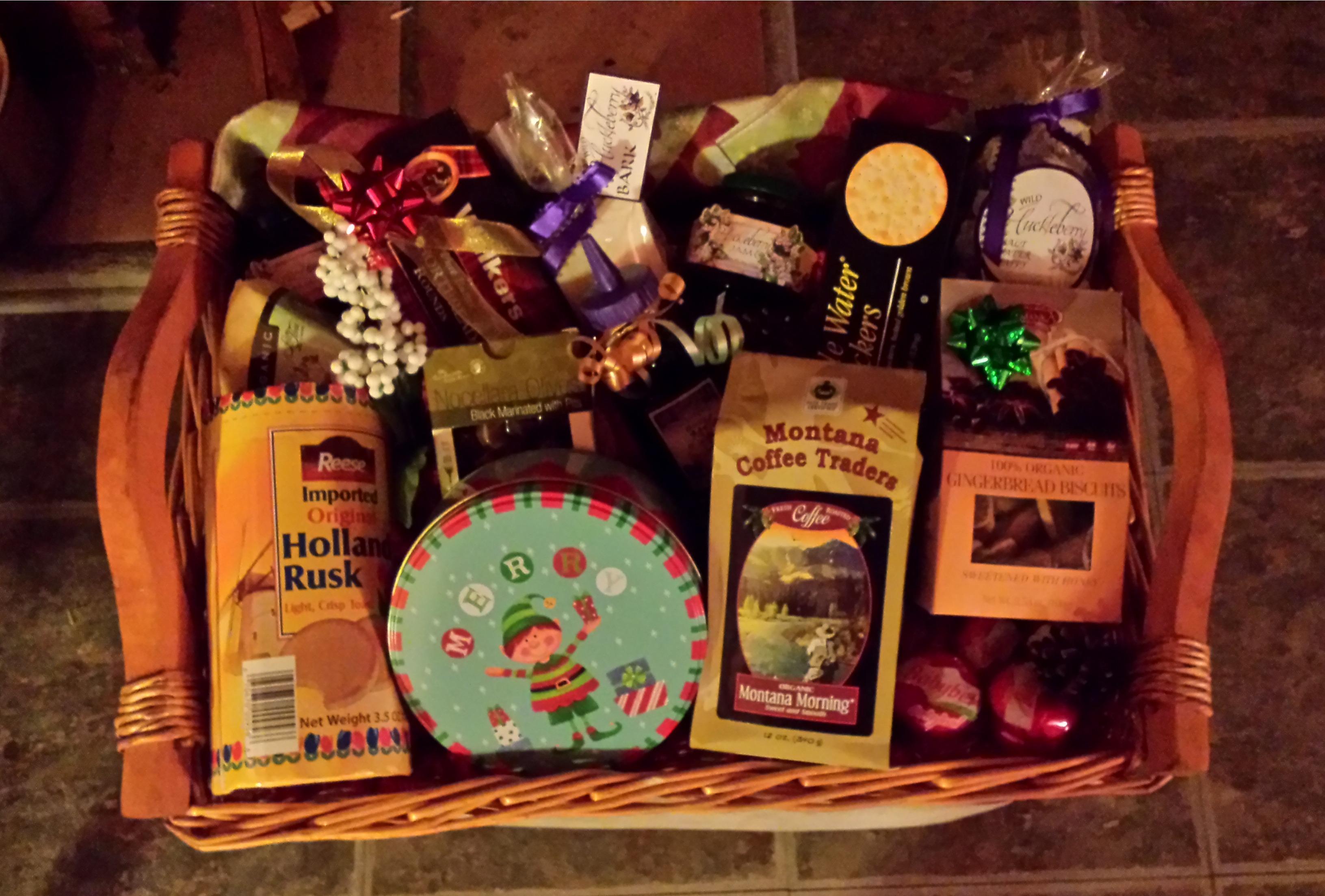 Basket Full Of Yummy Treats Includes Fair Trade Locally Roasted Coffee And Huckleberry Products Such As Jams Syrup Cans