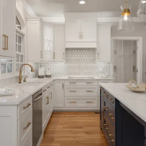 Custom kitchen remodel near Badin Lake, North Carolina with white cabinetry, stone countertops, and a functional galley layout. This kitchen renovation demonstrates expert craftsmanship and high-quality residential remodeling services.