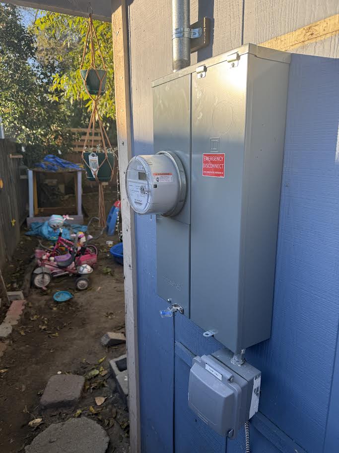 Janovich Electric inc Logo