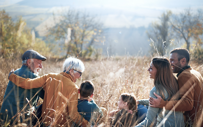 A multigenerational family on an outdoor adventure.