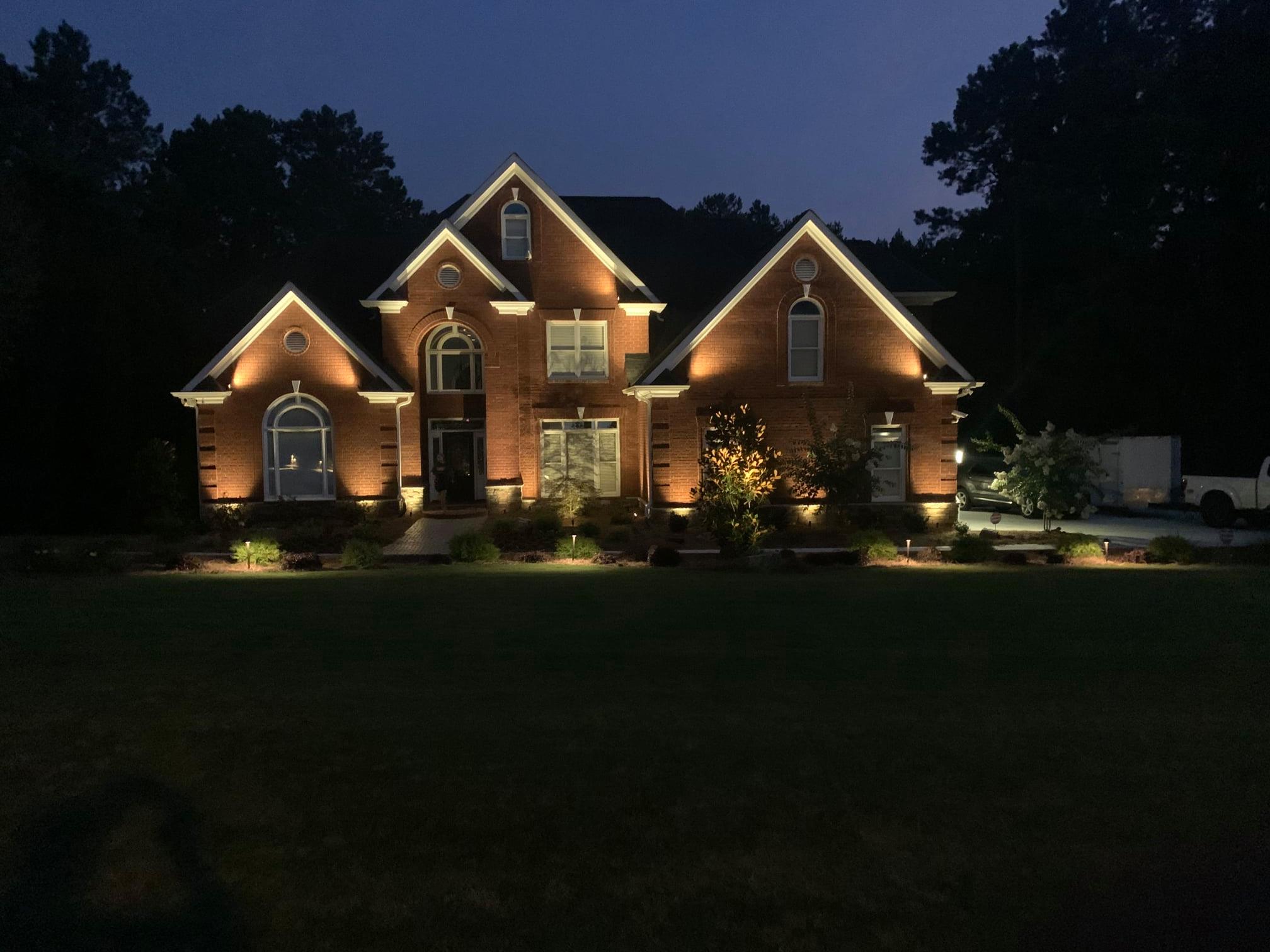 house with exterior lighting installed by Ways Electric