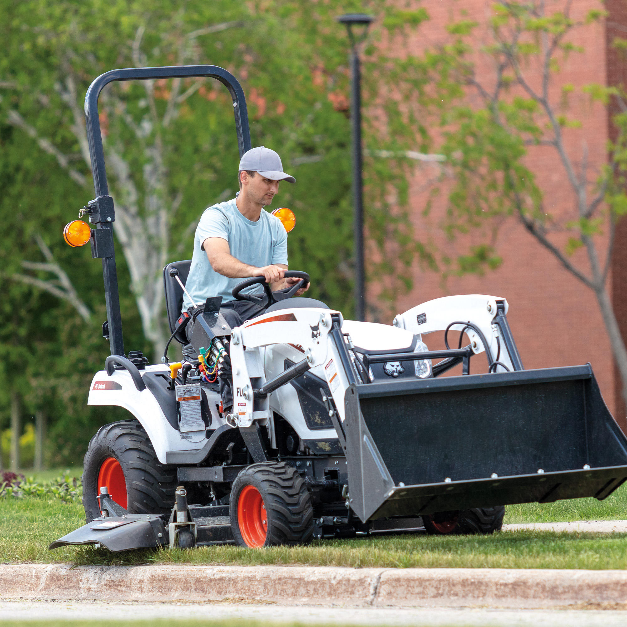 The Bobcat CT1025 with bucket and mid-mount mower Paul Equipment Fredericton (506)449-3289