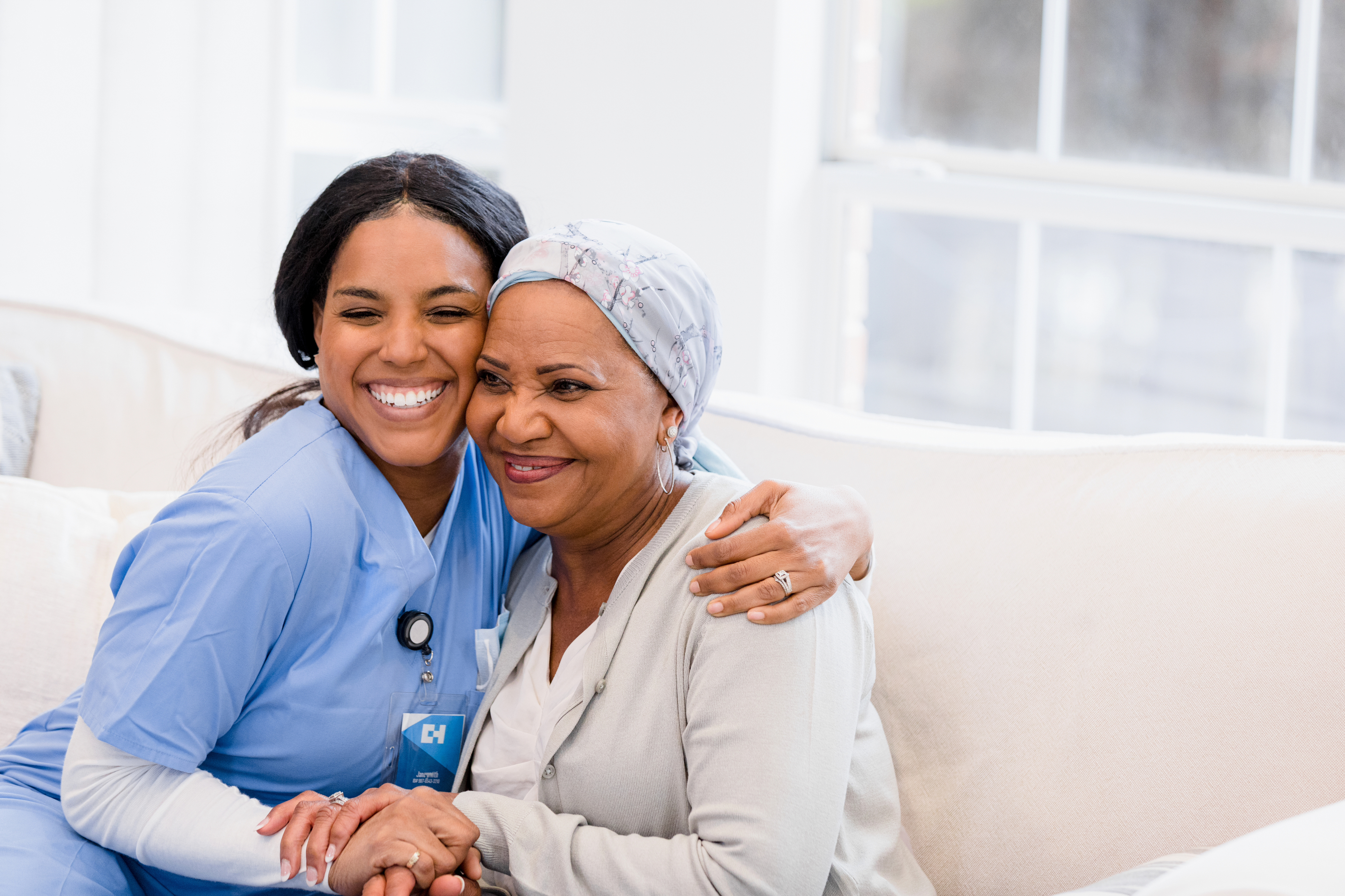 Nurse hugging patient