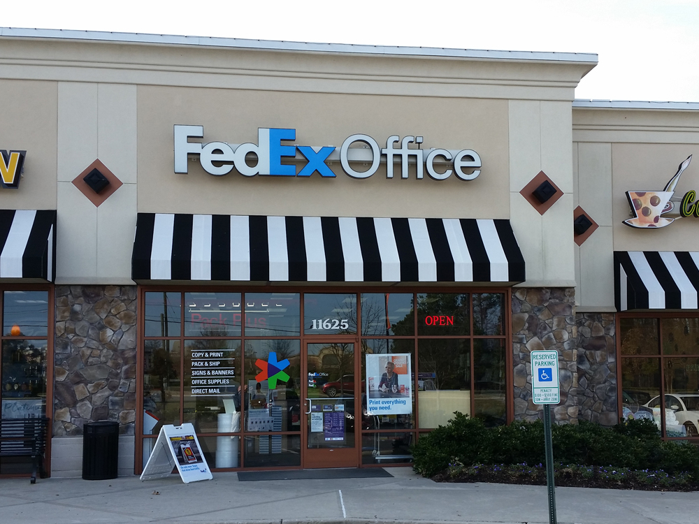 Exterior photo of FedEx Office location at 11625 W Broad St\t Print quickly and easily in the self-service area at the FedEx Office location 11625 W Broad St from email, USB, or the cloud\t FedEx Office Print & Go near 11625 W Broad St\t Shipping boxes and packing services available at FedEx Office 11625 W Broad St\t Get banners, signs, posters and prints at FedEx Office 11625 W Broad St\t Full service printing and packing at FedEx Office 11625 W Broad St\t Drop off FedEx packages near 11625 W Broad St\t FedEx shipping near 11625 W Broad St
