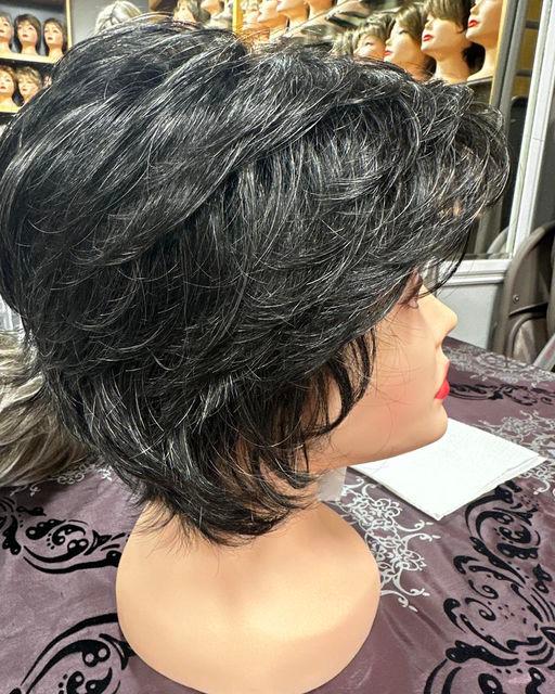 Wig of the Week: This striking salt and pepper wig color captures the natural arrival of silver stra Merle Norman Cosmetics, Wigs and Boutique Antioch (224)788-8820