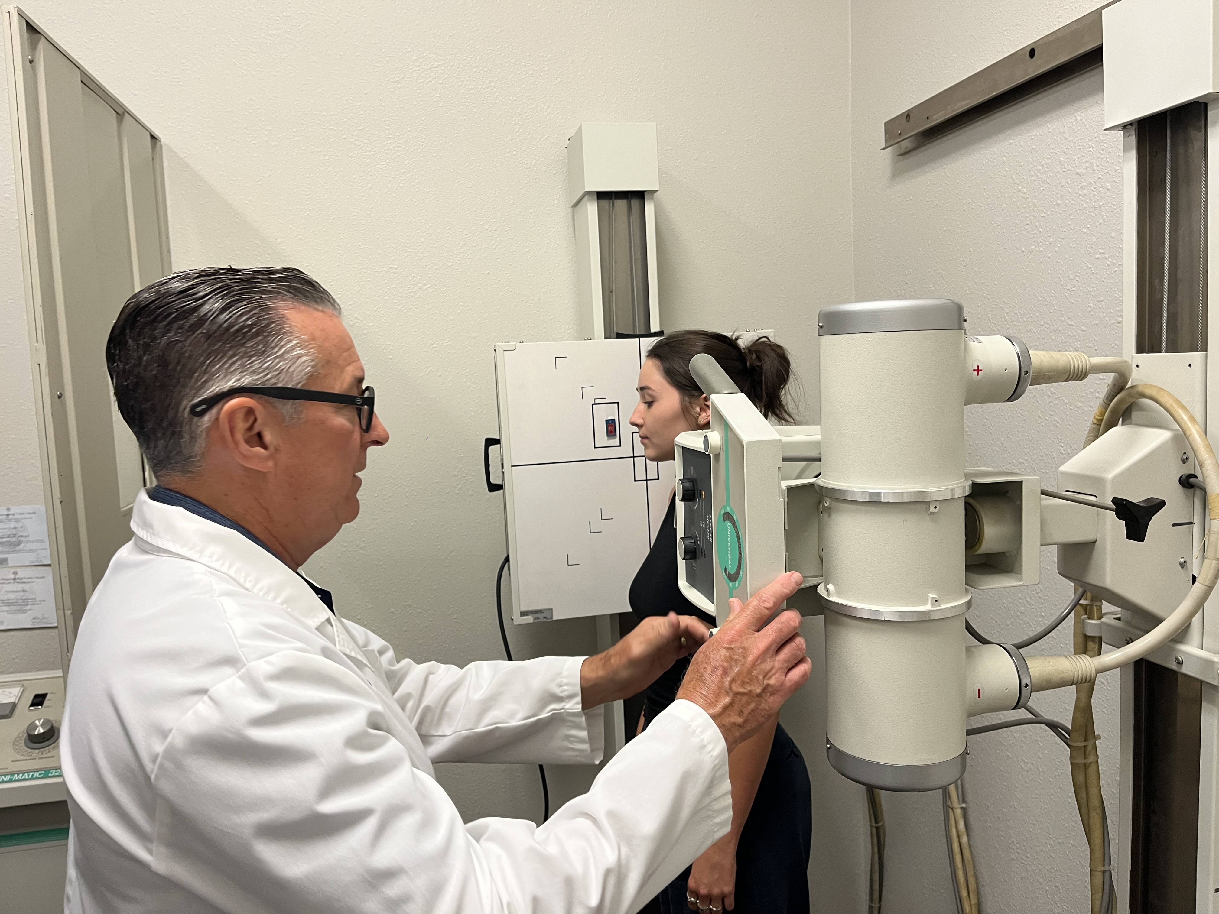 Dr. Pontious taking x-rays of patient