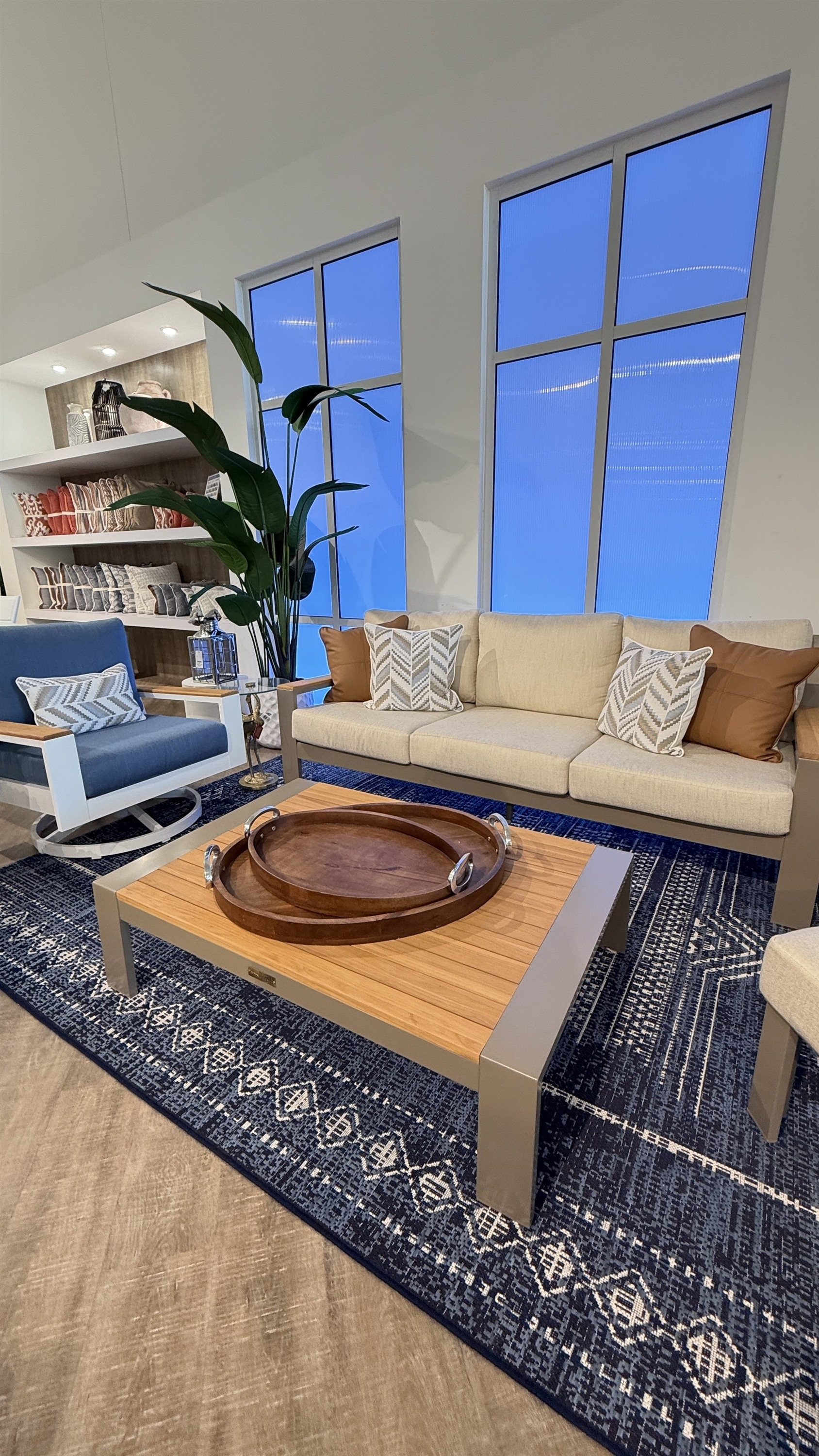 Relax in style with this aluminum-frame outdoor sofa and swivel chair set, part of the Rooms To Go 2026 Patio lineup.