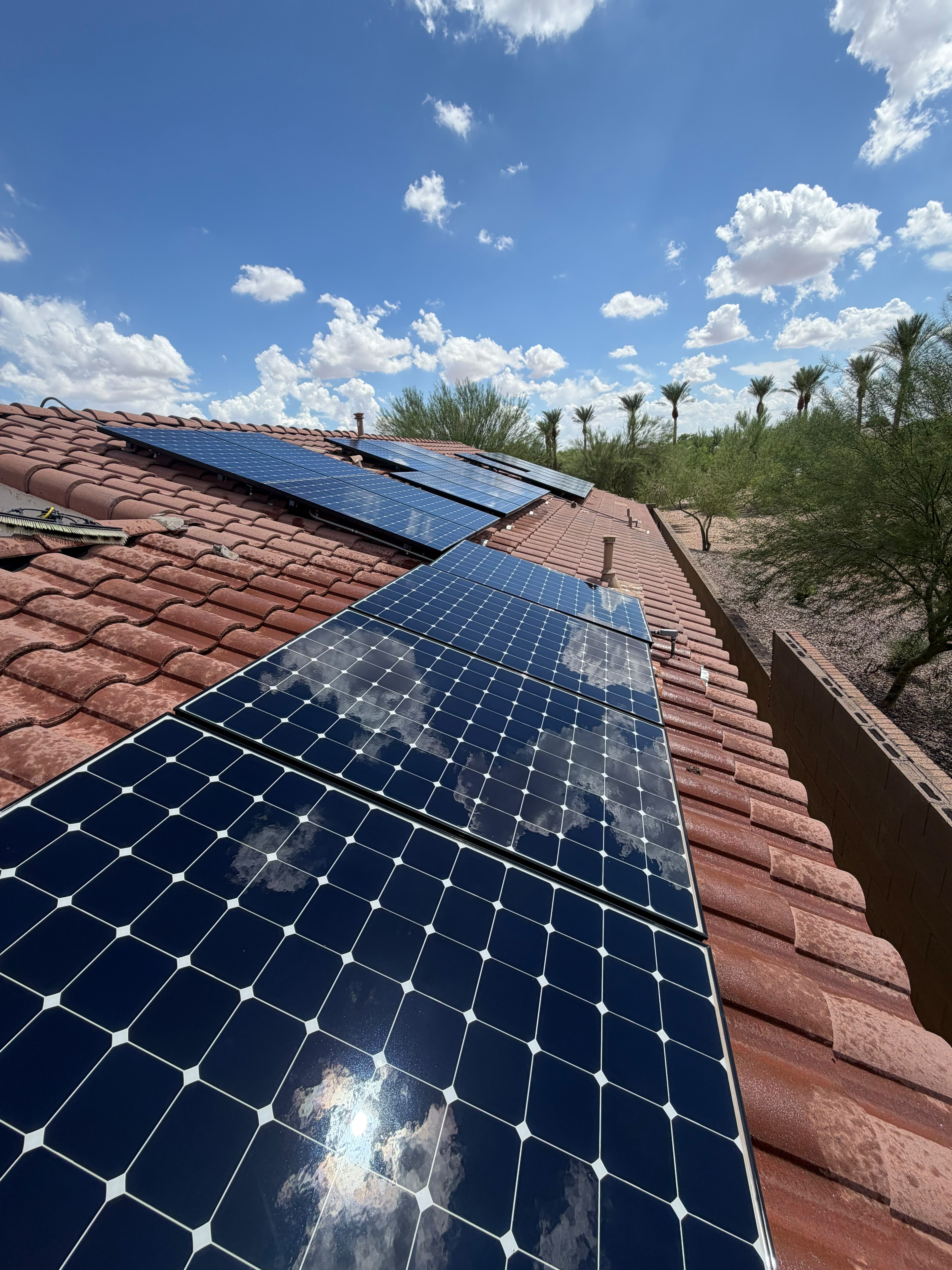 Residential solar panels undergoing professional cleaning by SunWorx Solar Services in Anthem at Merrill Ranch, Florence, Arizona.