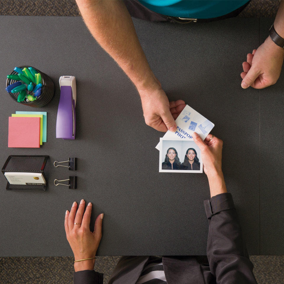 Customer receiving passport photos