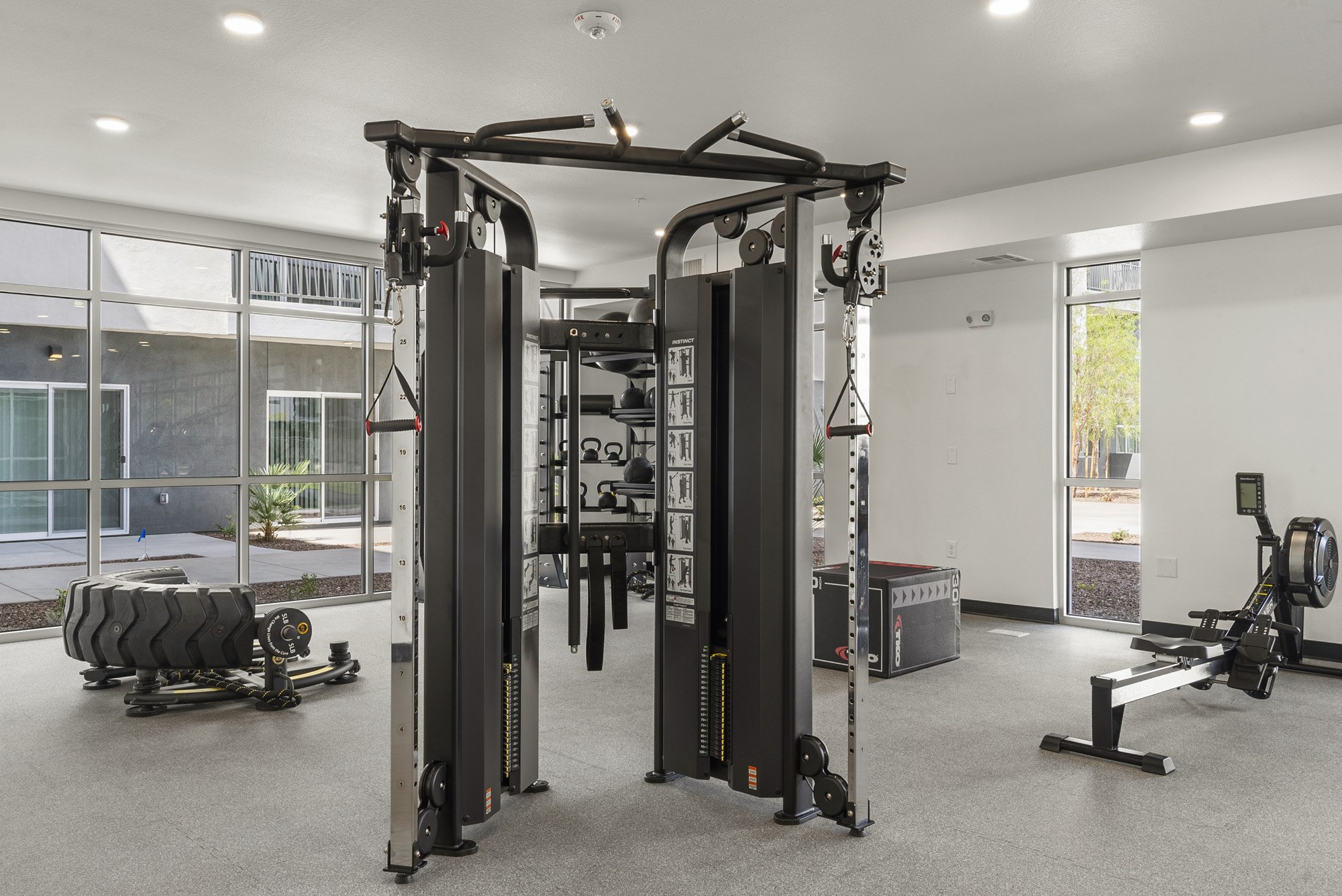 Fitness center with cable machine and rowing equipment