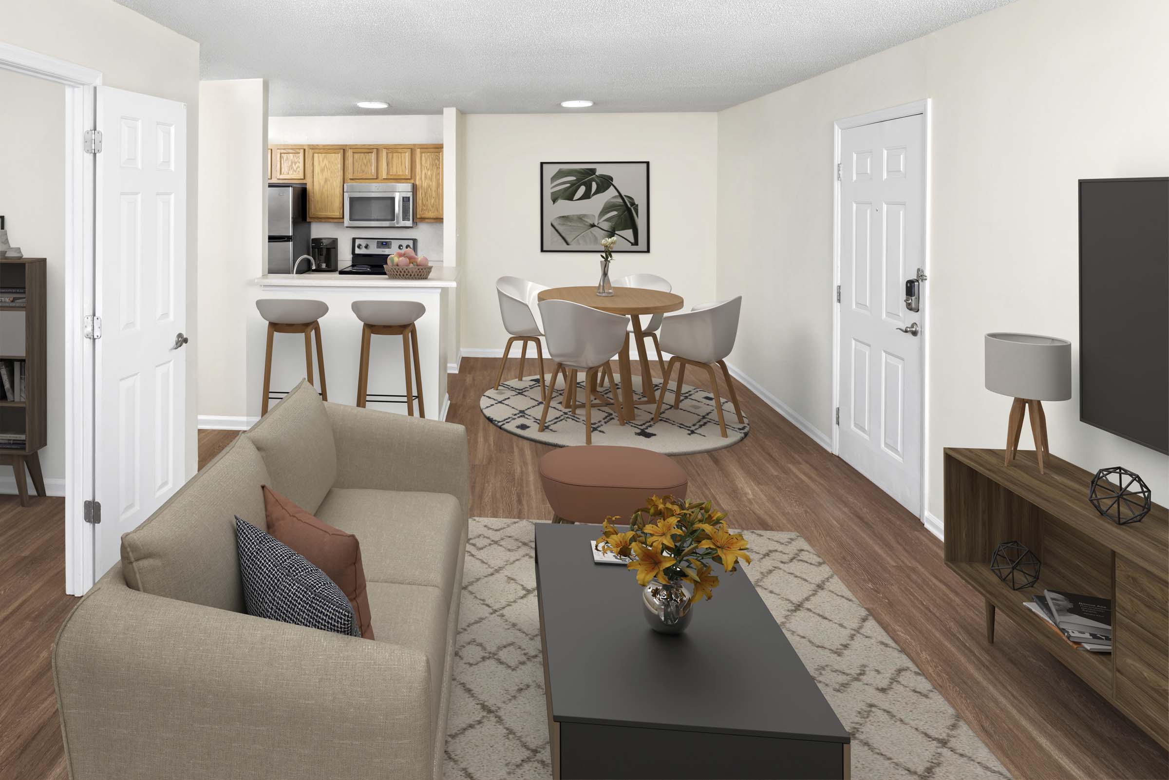 Kitchen and dining room with wood-style flooring at Camden Touchstone apartments in Charlotte, NC